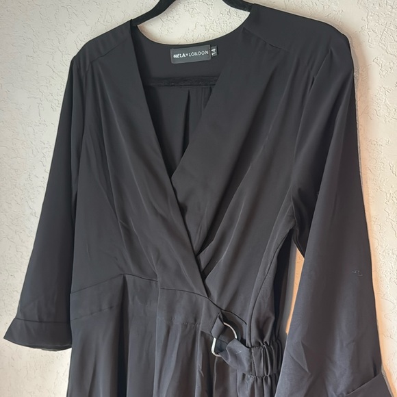 Mela London Dresses & Skirts - Gorgeous black Mela London mini dress